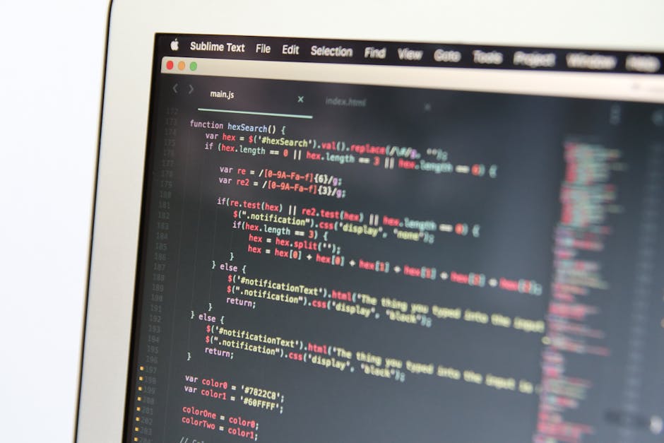 A computer screen displaying a code editor with syntax-highlighted JavaScript code, featuring functions and variables related to web development. The code is organized into sections with colored text 